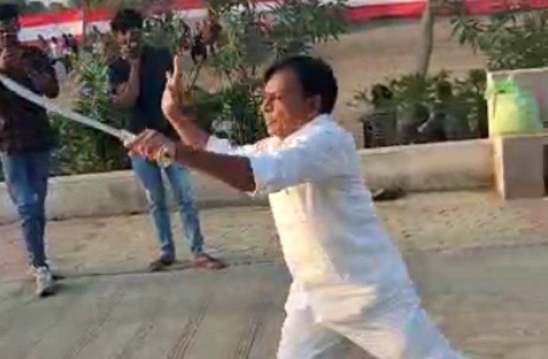 jagdish Deora swinging sword