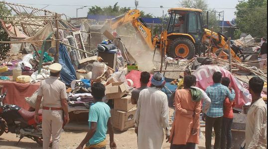Lady Reaches in-laws House with Bulldozer