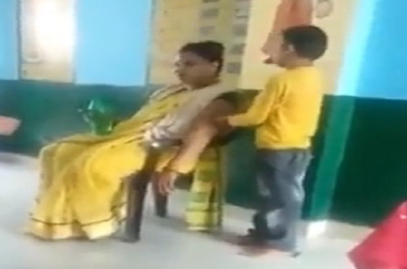 female teacher getting massage from student