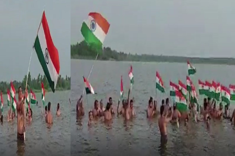 Tricolor flag hoisted in the middle of the water