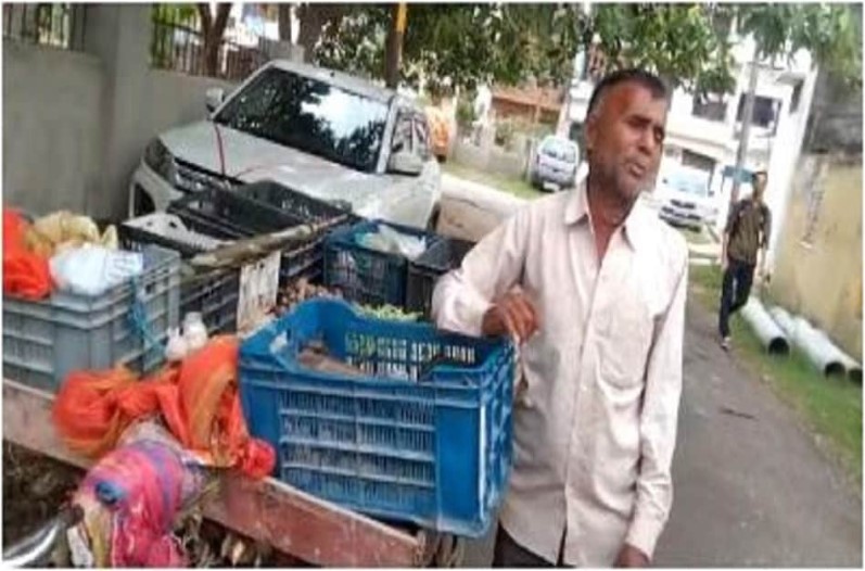 Seller urinating on vegetable