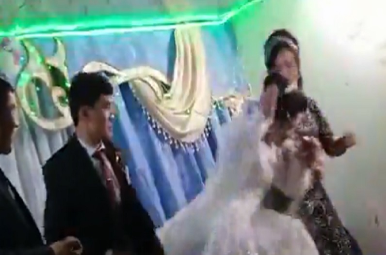 groom slaps bride