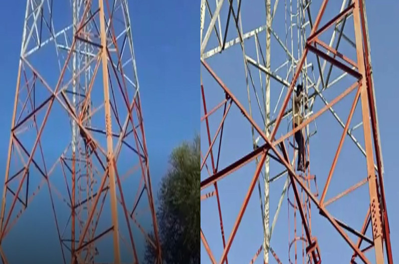 boyfriend climbed on mobile tower