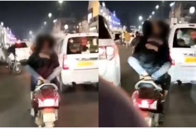 ना जान की परवाह न जानू की…,बीच सड़क चलती स्कूटी पर नाबालिग से रोमांस करते युवक का Video वायरल