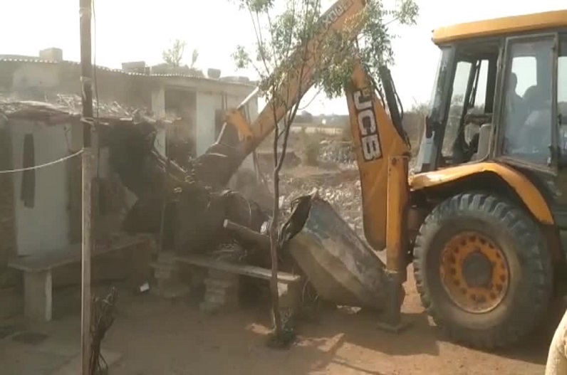 bulldozer on illegal encroachment