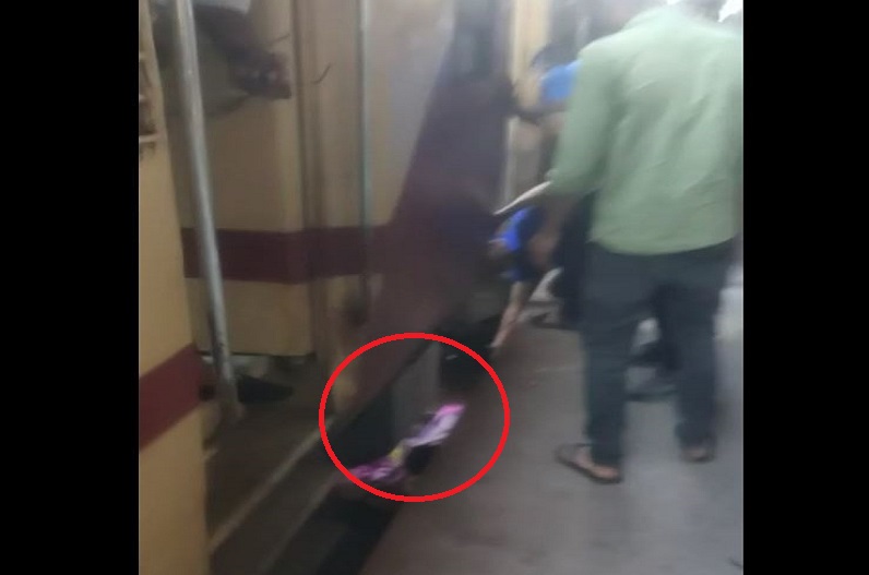 Woman fell on track from moving train, local people saved her life by rescuing her