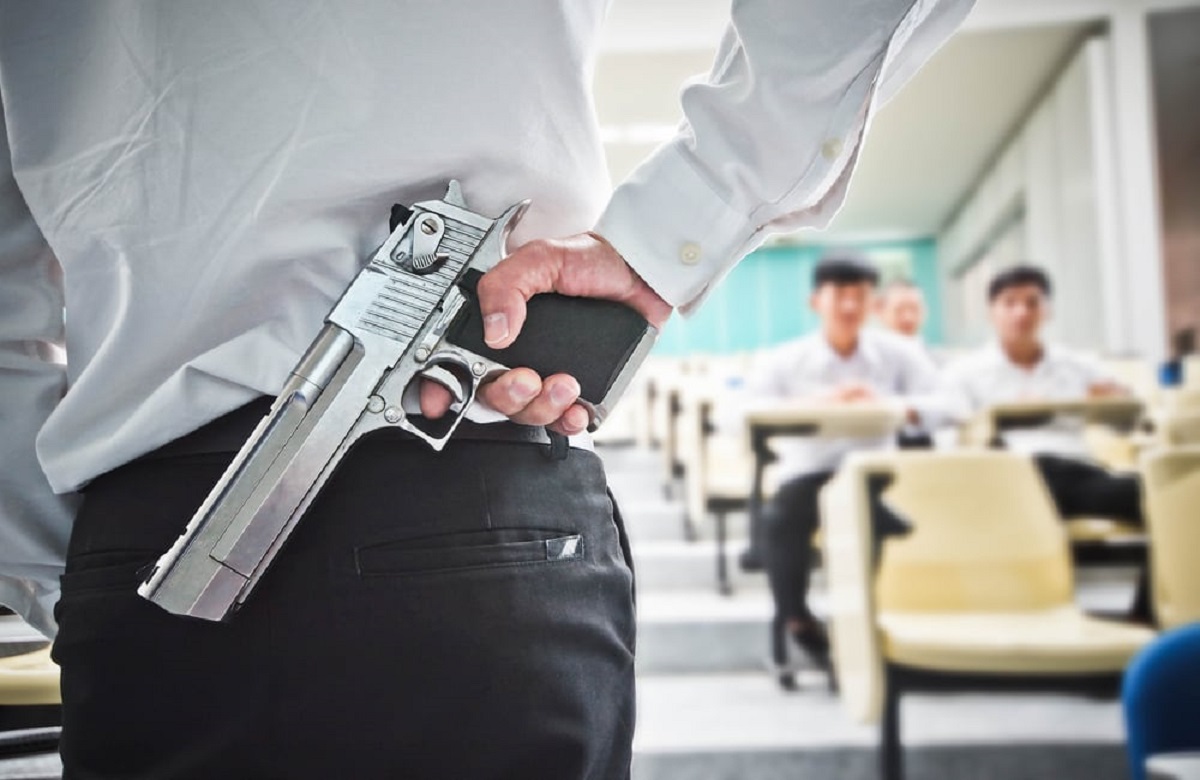 Suspended teacher reach school premises with gun