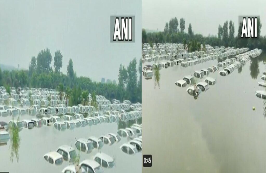 Cars submerged in waterlogged Noida