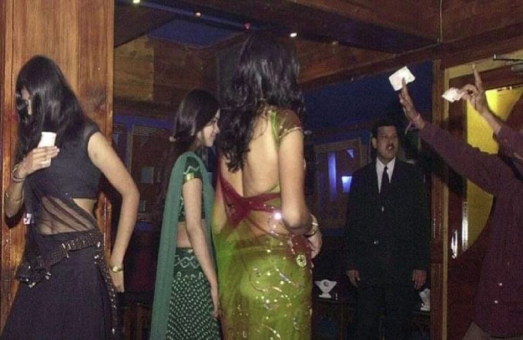 34 booked for 'obscene acts' at bar