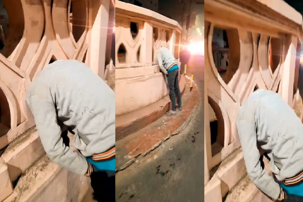 Drug addict youth's neck stuck in the railing