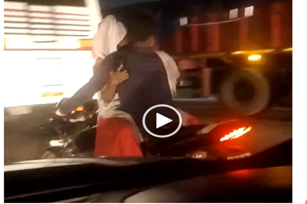 couple romancing on bike Video