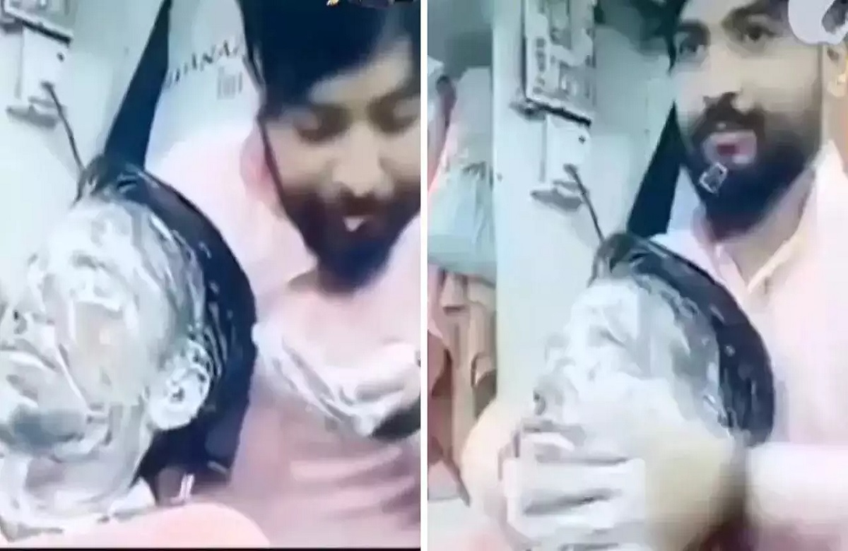 अपनी थूक लगाकर युवक का फेस मसाज कर रहा था नाई, वीडियो वायरल होने के बाद मचा बवाल
