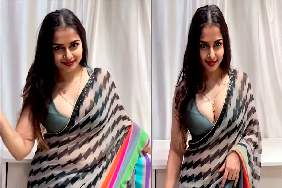 Indian Bhabhi Sexy Video : Indian Bhabhi ने पार की बोल्डनेस की सारी हदें, डीपनेक ब्लाउज में फ्लॉन्ट किया सेक्सी फिगर