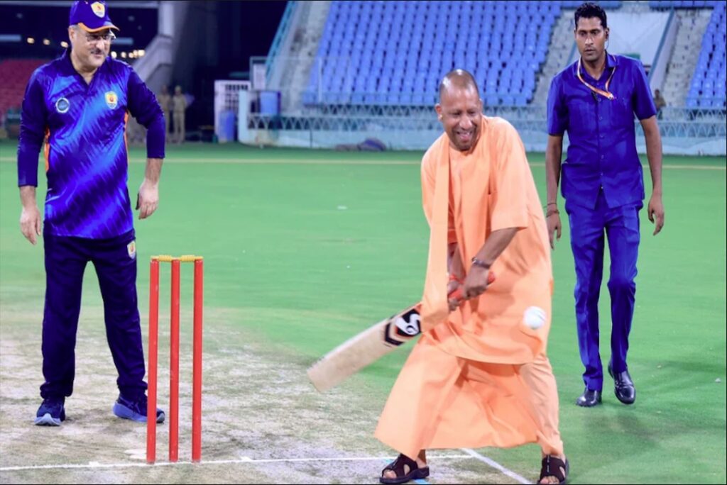 CM Yogi played cricket match hit shot