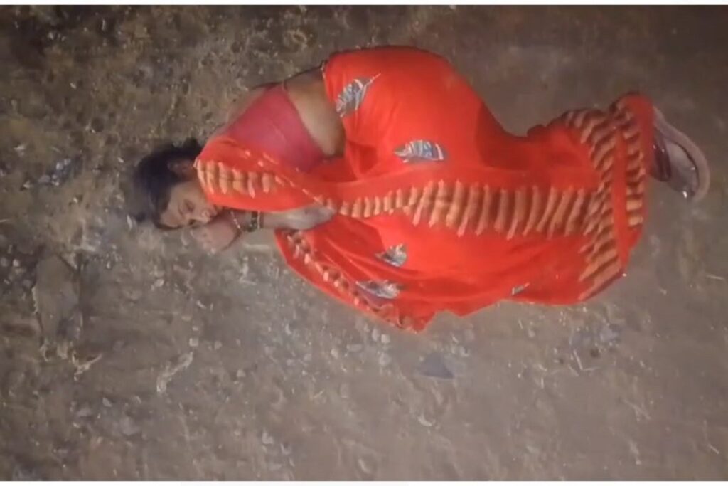 Drunk woman lying in the middle of the road