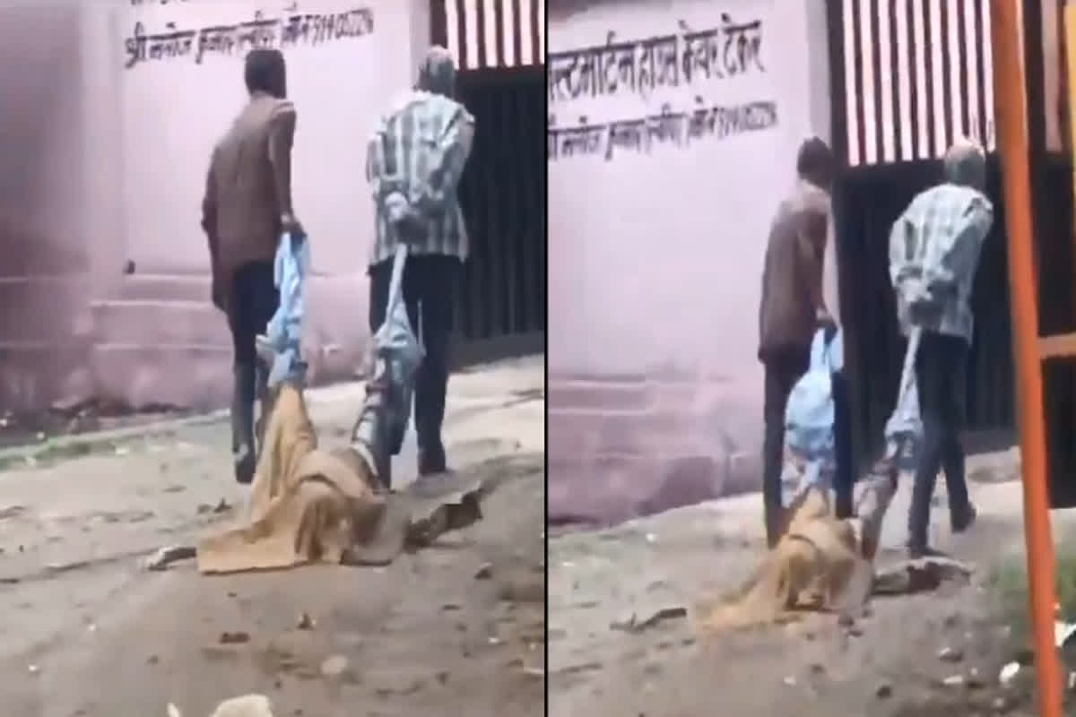 Jhansi Viral Video: शर्मसार… पोस्टमार्टम हाउस के बाहर डेड बॉडी के साथ ऐसी हरकत करते दिखे कर्मचारी, देखें वीडियो