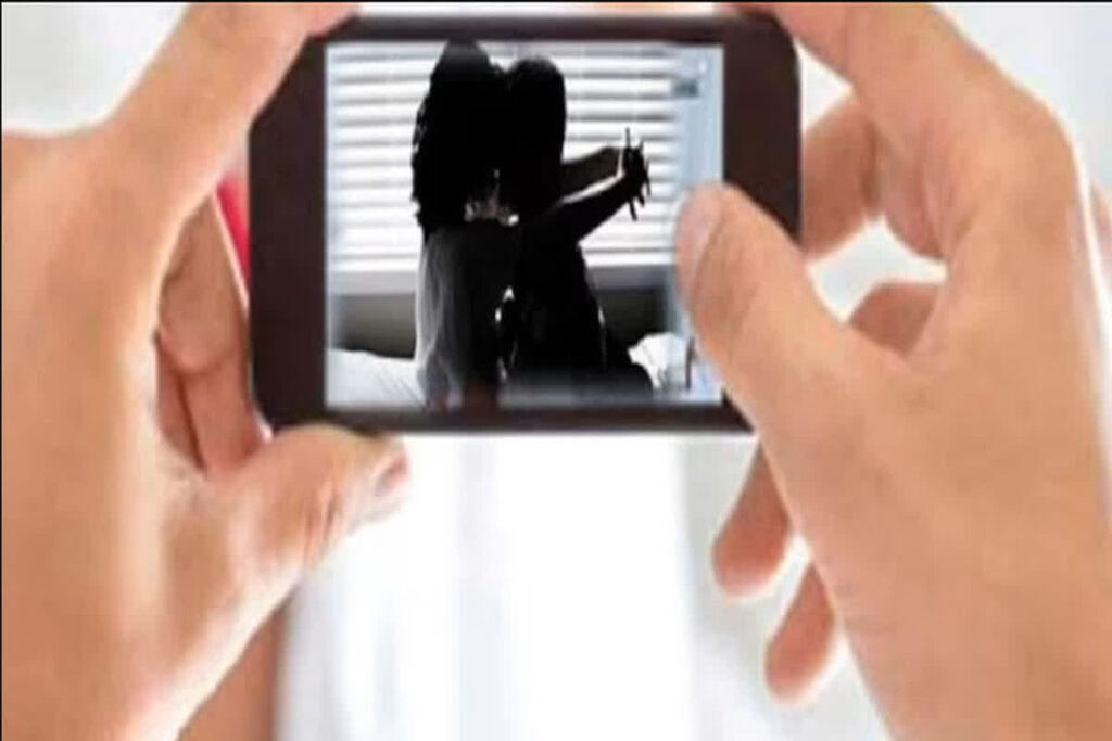 Girl Showing Porn Video | Image Source | Symbolic