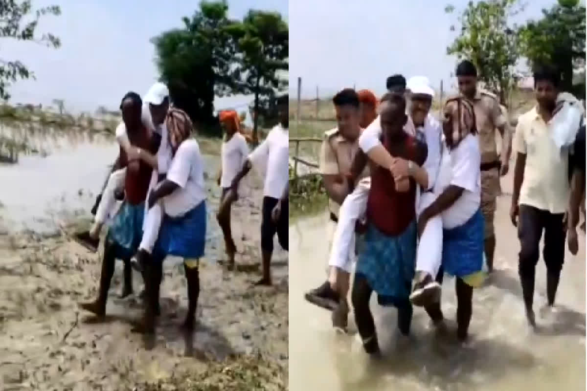 MP Tariq Anwar Viral Video: ग्रामीण के कंधे पर बैठकर सांसद महोदय ने किया बाढ़ प्रभावित क्षेत्रों का निरीक्षण, वीडियो वायरल होने के बाद मचा बवाल